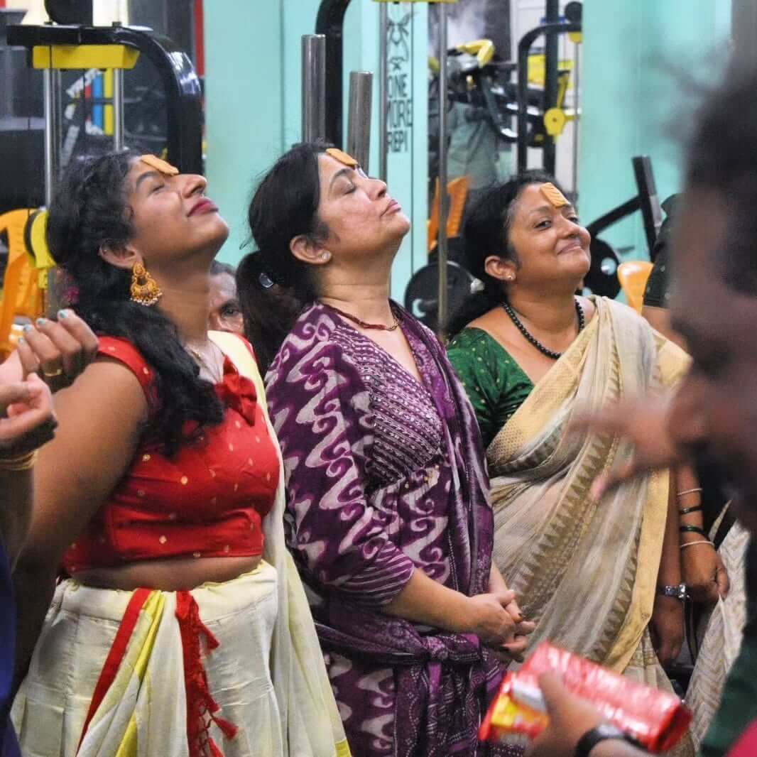 Gym hosting a fitness festival with music, food, and workout sessions for the community