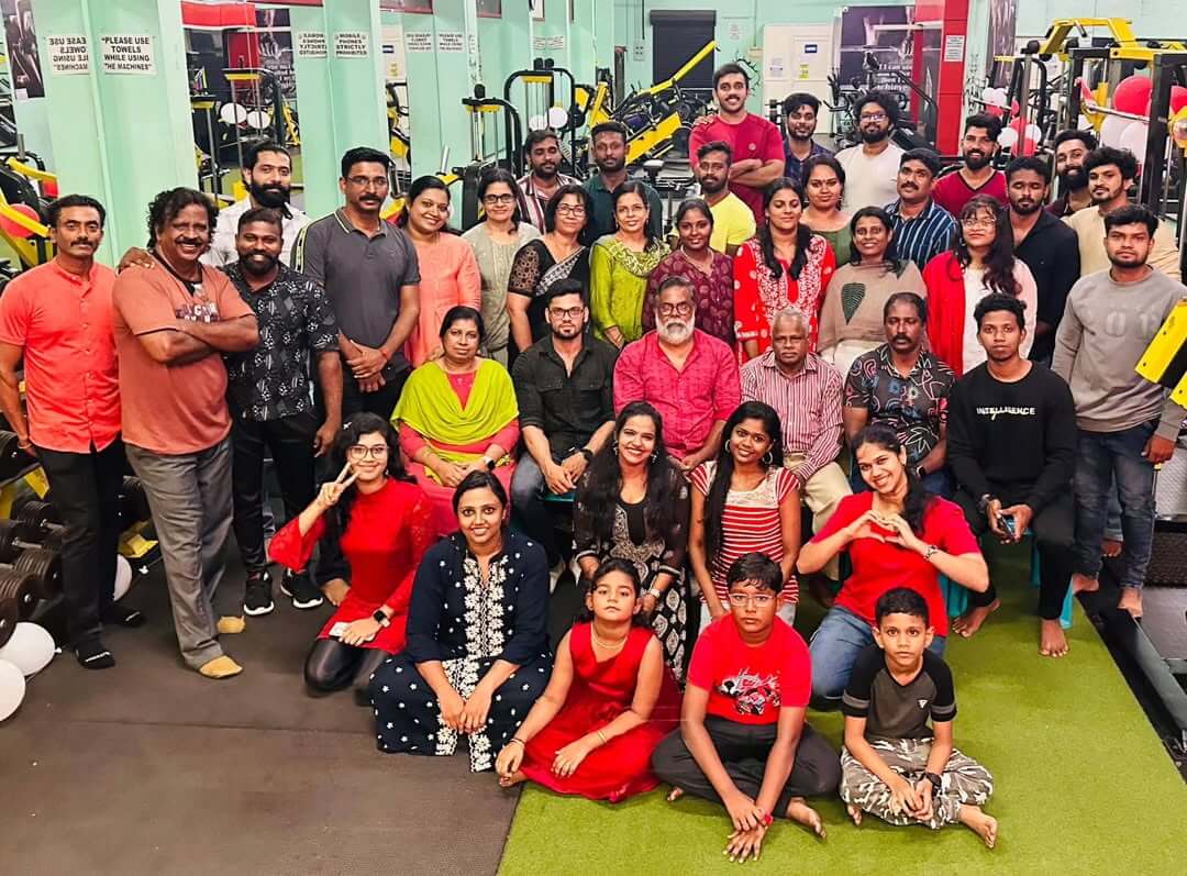 Gym hosting a fitness festival with music, food, and workout sessions for the community