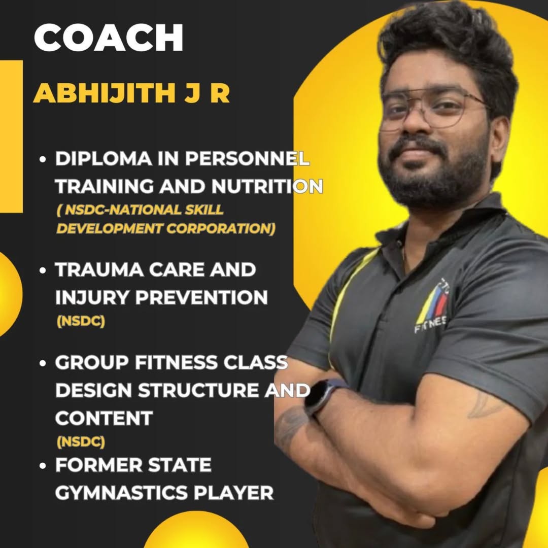 Certified personal trainer with a strong physique standing in the gym